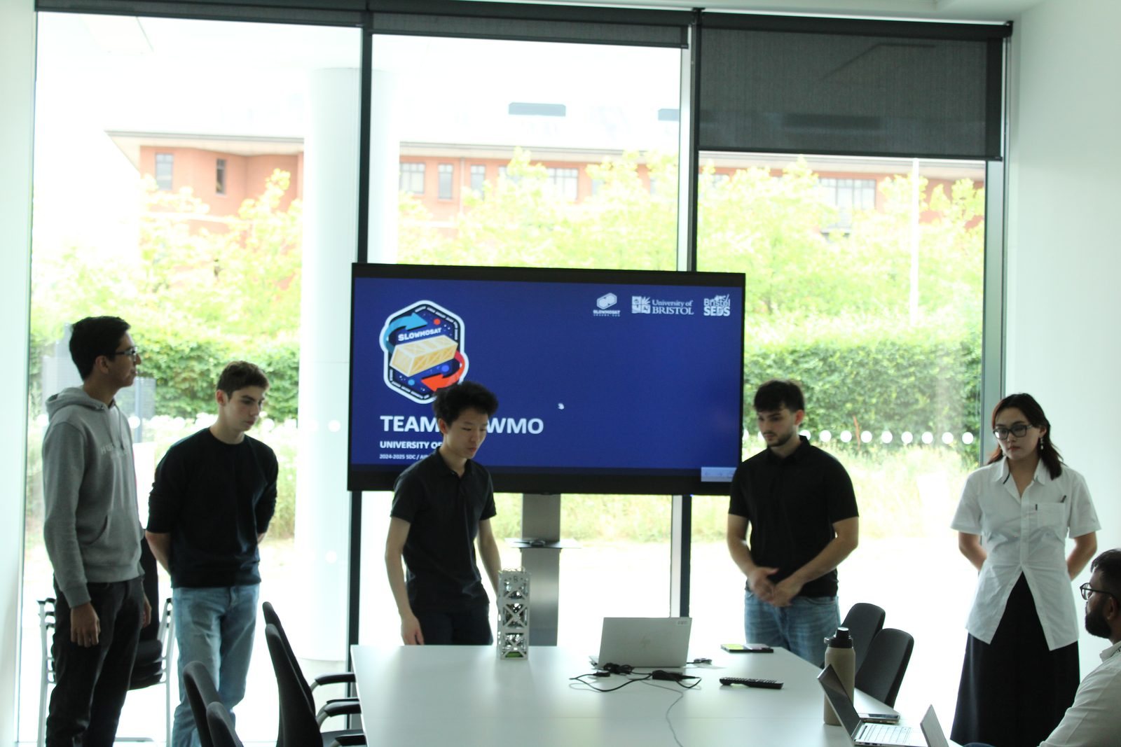 Team SLowMo presenting the CubeSat demonstrator to judges at Airbus Stevenage